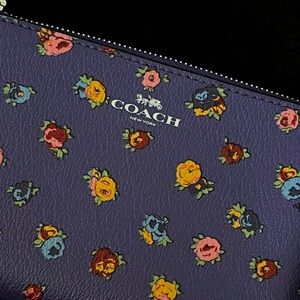 Coach wristlet with yellow and red roses